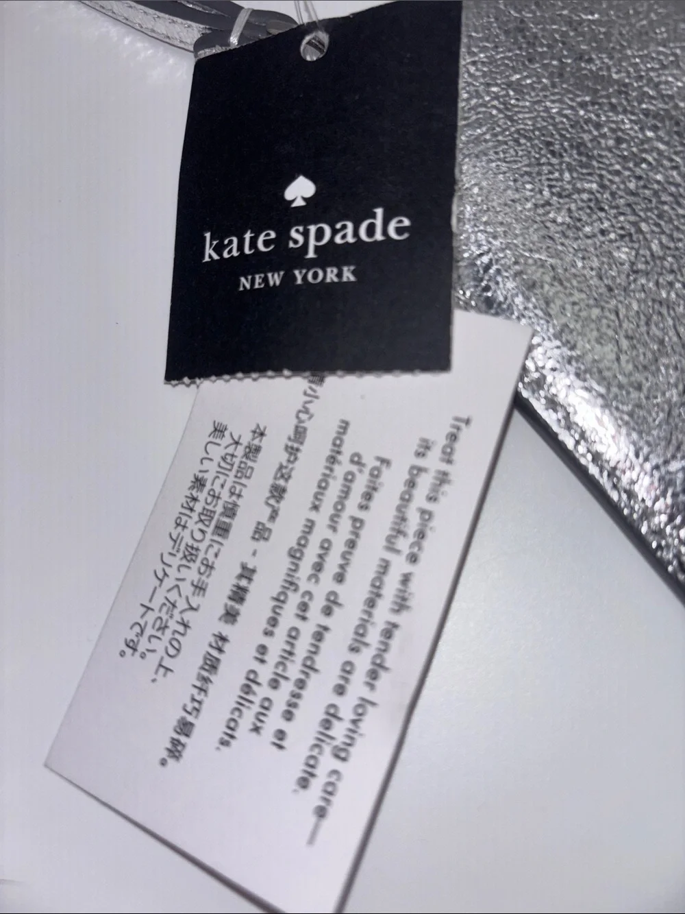 kate spade Silver Metallic Wristlet Clutch